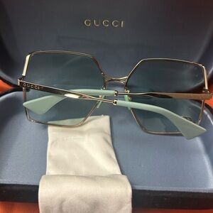 Gucci Gold Frame Sunglasses with Blue Lenses